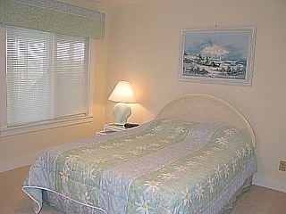 The 2nd bedroom features all new mattresses, bedspreads, and pillows.